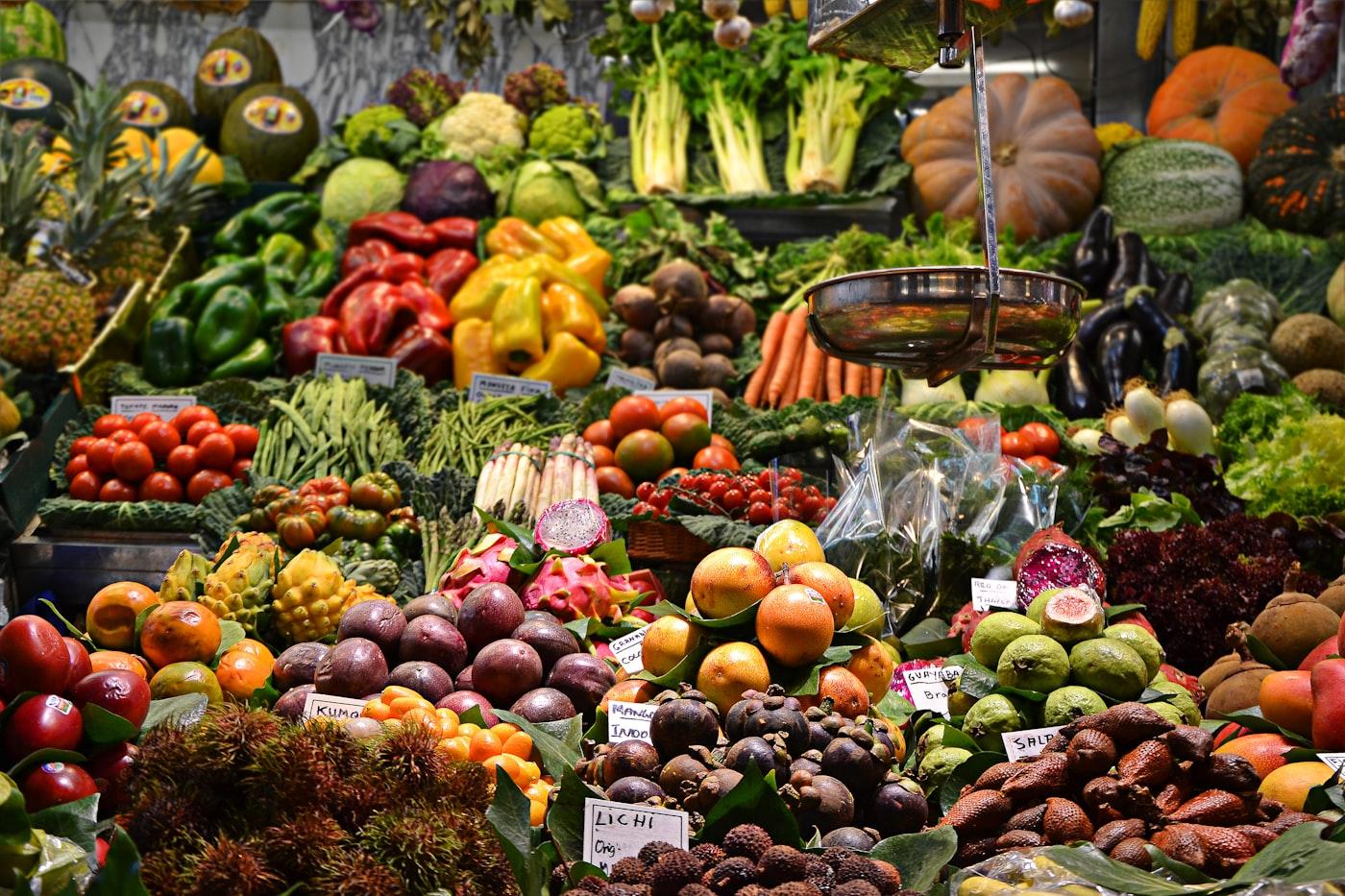A market stall laden with fresh produce